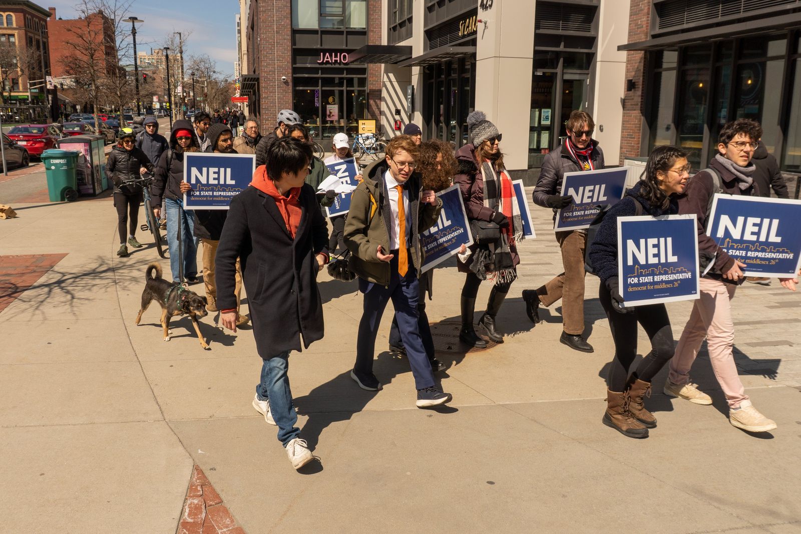 Neil's team marching with campaign signs