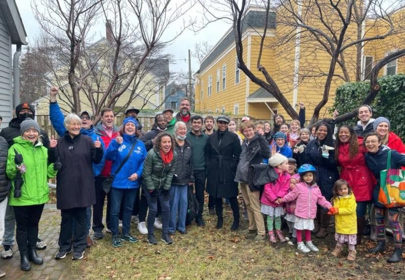 Neil with community members canvassing