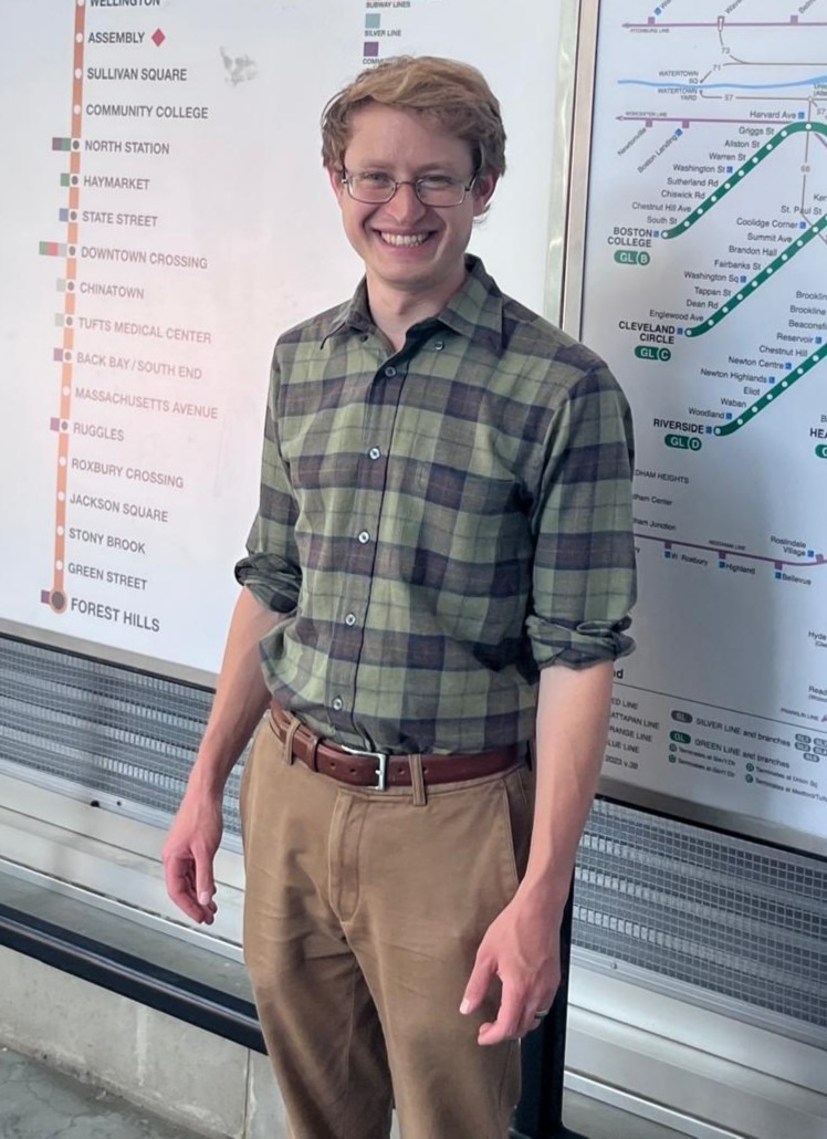 Neil at an MBTA line map