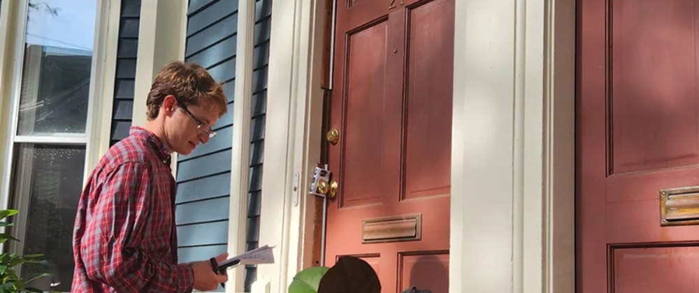 Neil Miller canvassing door to door
